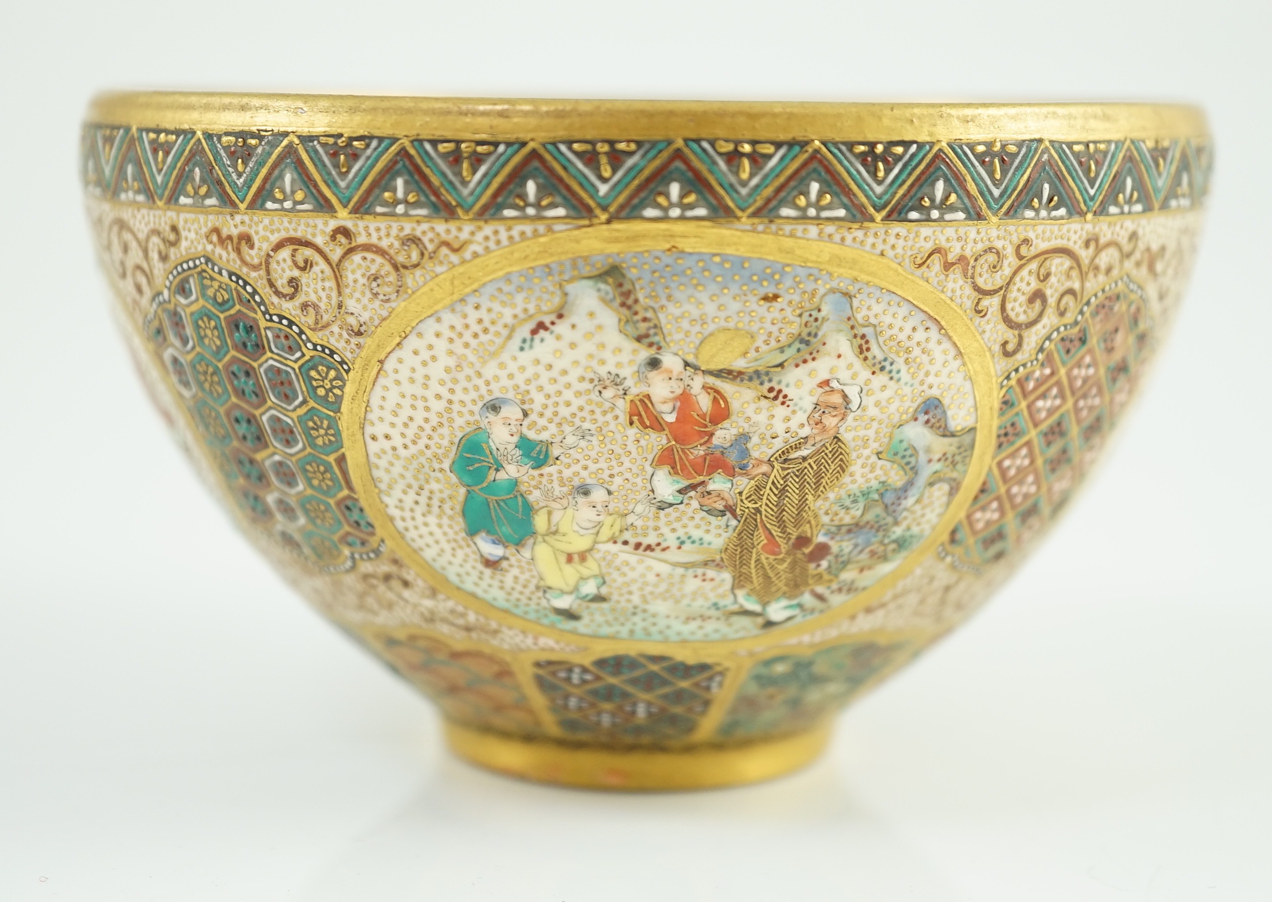 A Japanese Satsuma pottery ‘thousand butterfly’ bowl, Meiji period, 11cm diameter